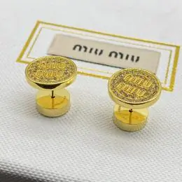 miu miu boucles doreilles pour femme s_1213033